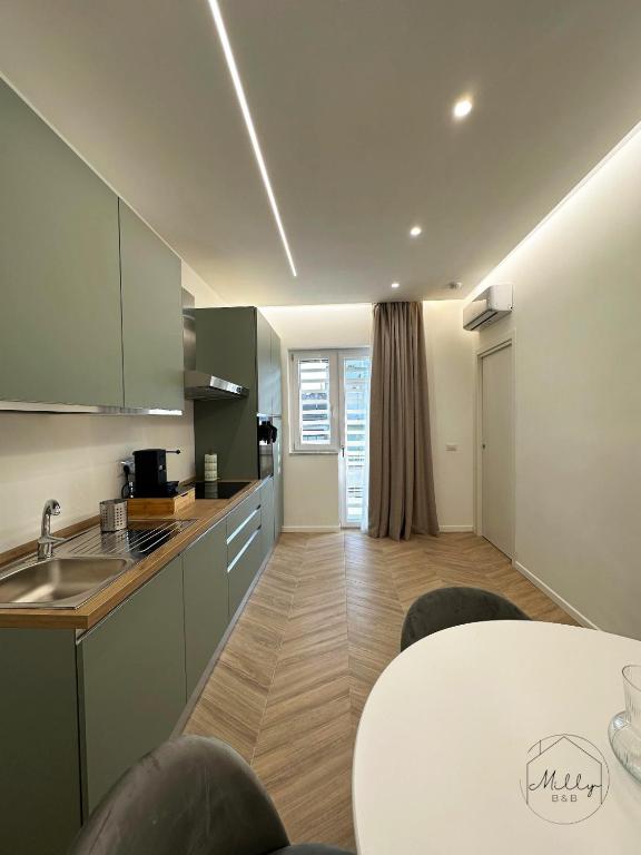 Soggiorno per vacanze con cucina attrezzata a Frattaminore